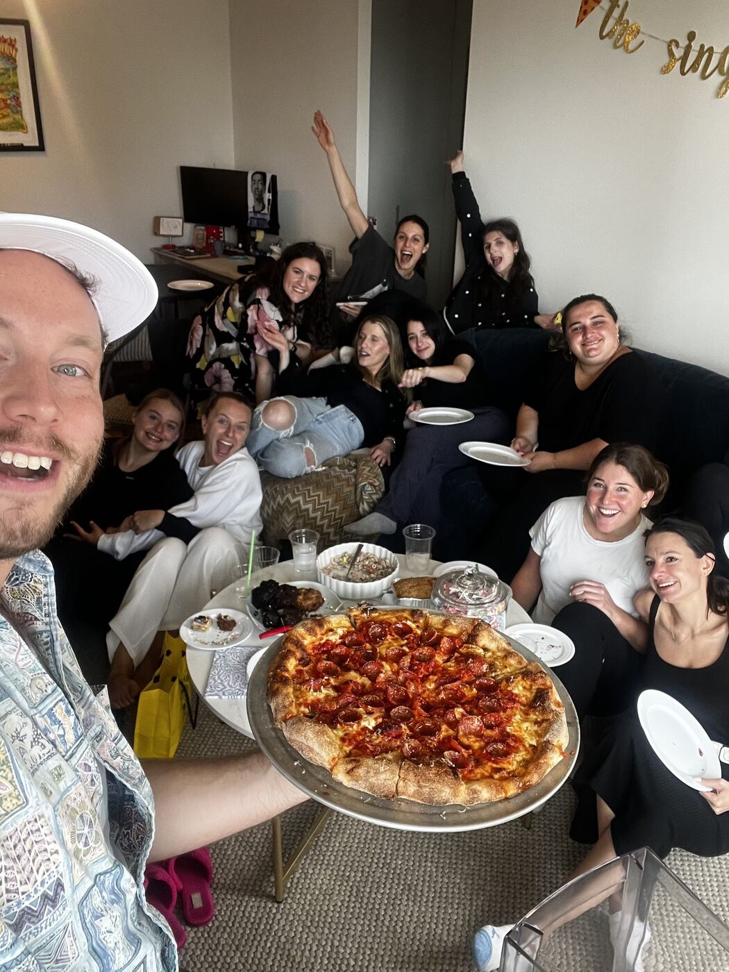 Happy guests at a Cheflon private pizza party